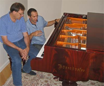 Tom and Jan fine tuning my Imperial Piano