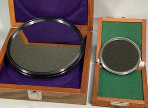 Questar 7 and 3-1/2 full aperture solar filters. Each shown in optional storage case (29,902 bytes).