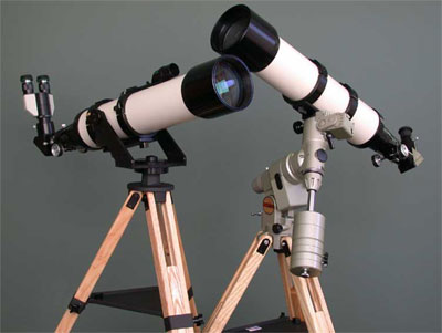 TeleVue NP127 telescope at left on optional Alt Az Mount at right on Vixen GP-DX Equatorial Mount. 